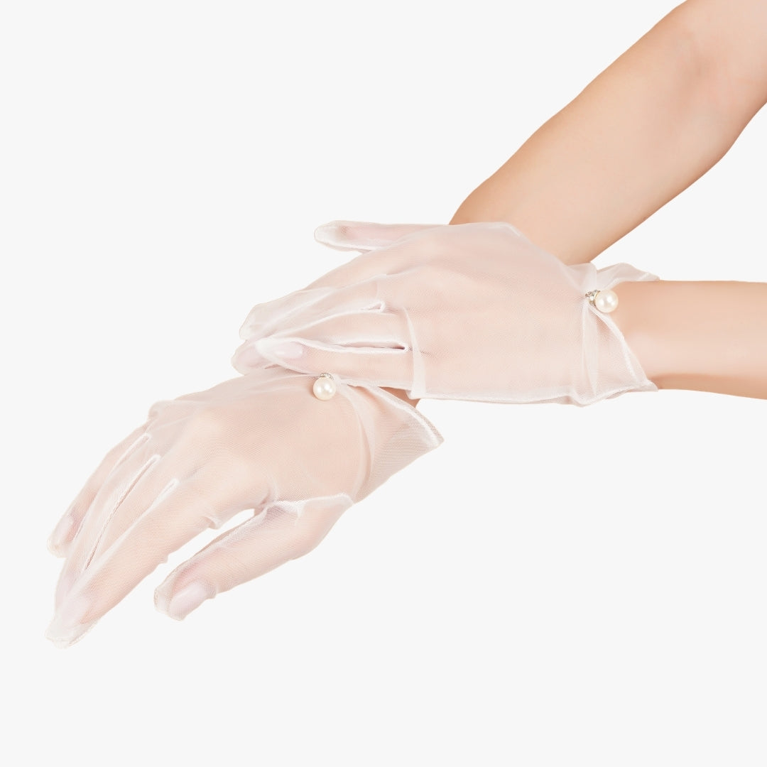 Totka style wrist-length white net gloves for cocktail parties and western bridal looks.