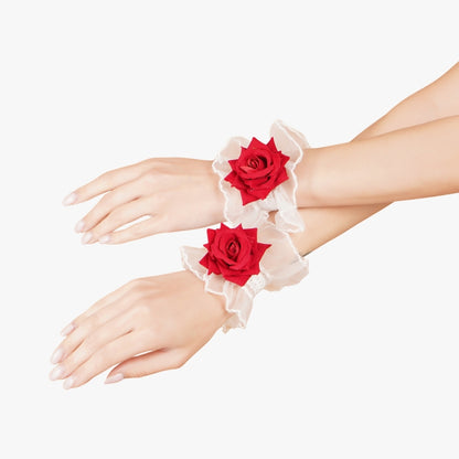 Detail shot of Totka pair of white organza red rose wristlets; lightweight floral Haath Phool for traditional and modern celebrations.